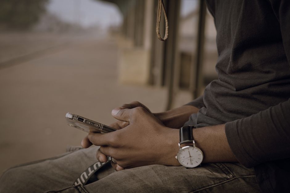 Young person using a smartphone outdoors
